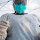 A health worker takes a nasal swab sample at a covid-19 testing site at St. John’s Well Child and Family Center in Los Angeles, California on July 24, 2020.